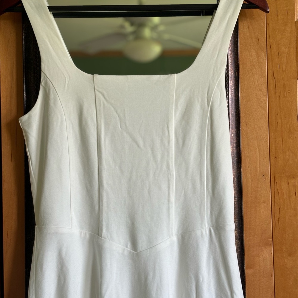 Elegant White Sleeveless Dress. Two available: sizes small and medium